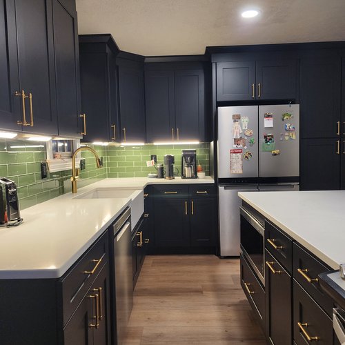 Remodeled Kitchen with Green Backsplash